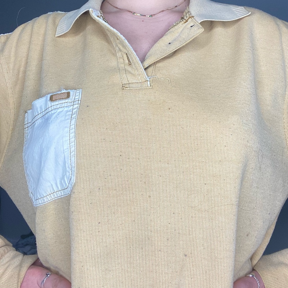 Kalamton yellow long sleeve shirt.